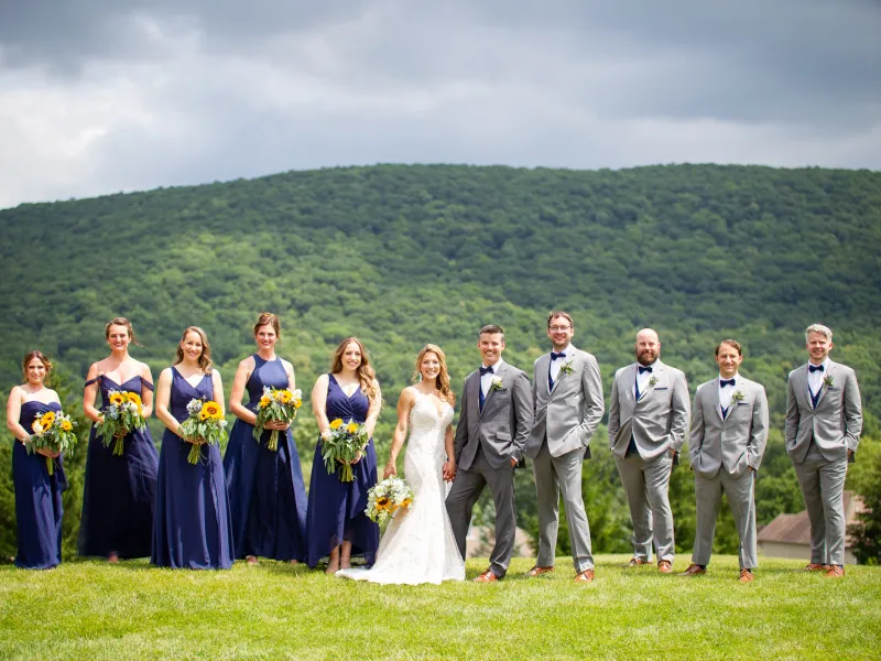 Wedding party standing together at Grand Cascades Lodge