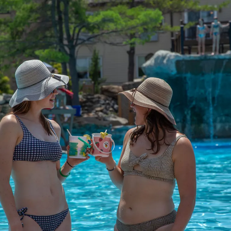 Girlfriends enjoying rum buckets at Minerals Pool