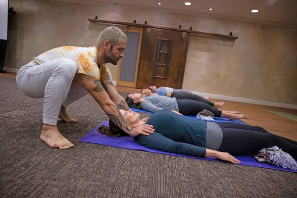 Bryan Paul teaching yoga class